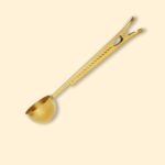 Cuchara con pinza dorada
